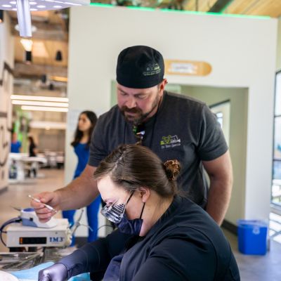 Dr. Garcia teaching a Dental CE course at Green Dog University